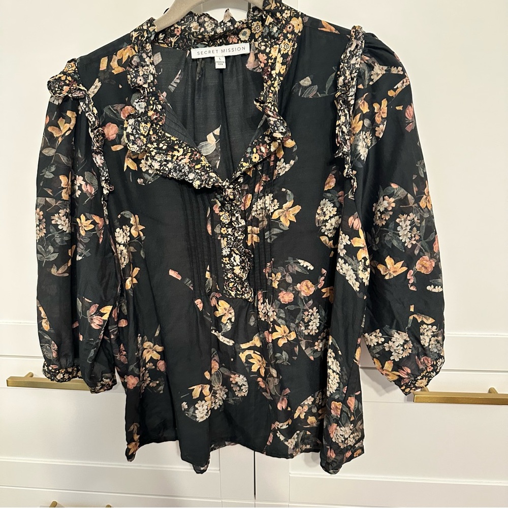 Secret Mission Black Floral Ruffle Blouse